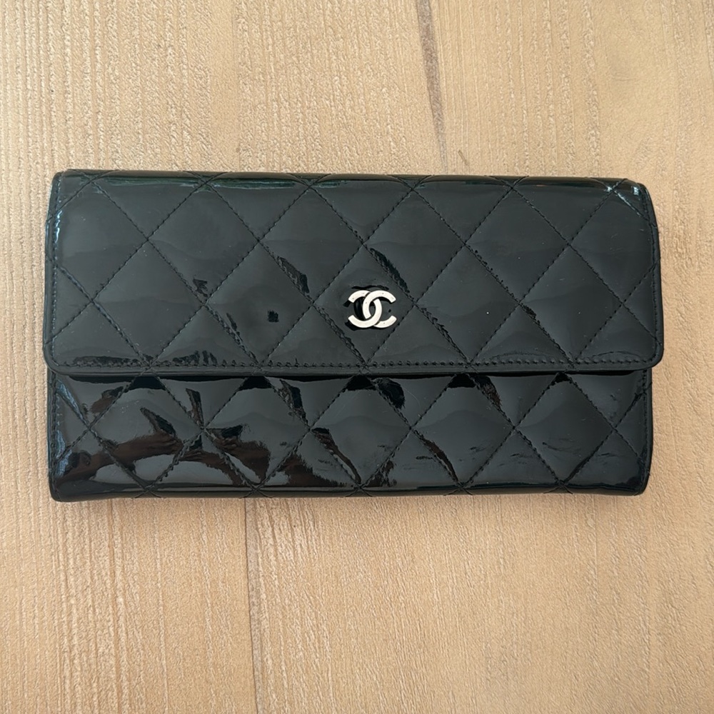 Black Patton, leather Chanel wallet with flap clasp